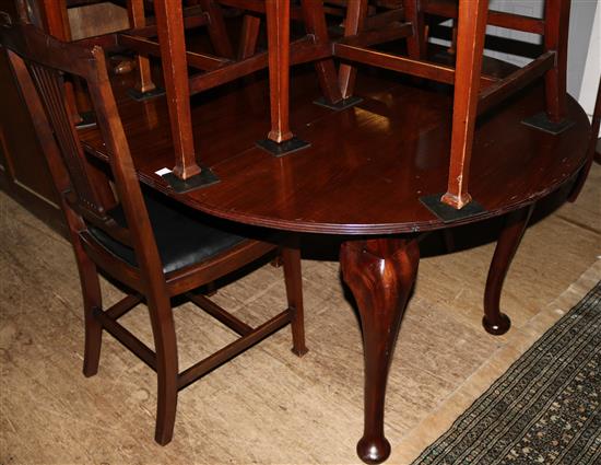 A 1920s mahogany extending dining table